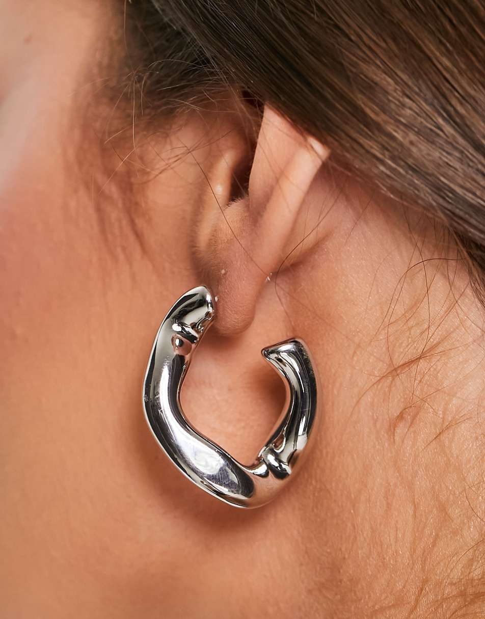 ASOS DESIGN hoop earring with twist link design in silver tone