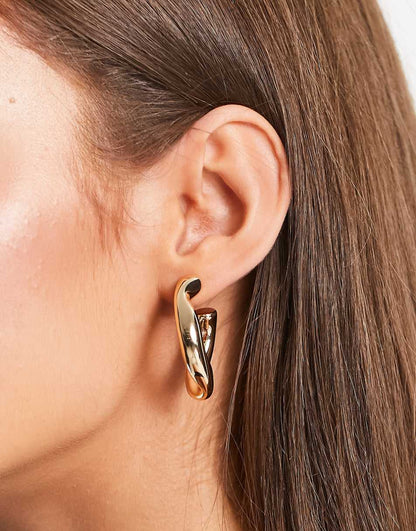 ASOS DESIGN hoop earring with twist link design in gold tone
