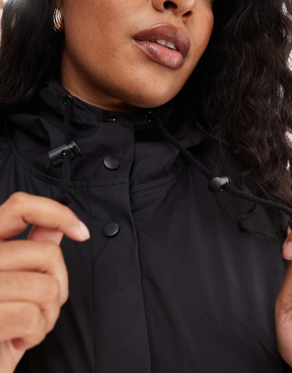 ASOS DESIGN Curve rubberized rain parka coat in black