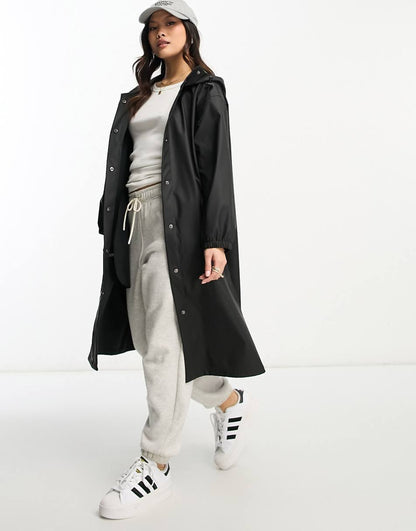 ASOS DESIGN Petite rubberized rain parka coat in black