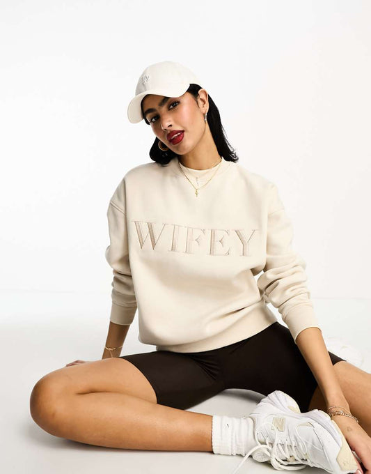 Six Stories Wifey statement sweater in champagne