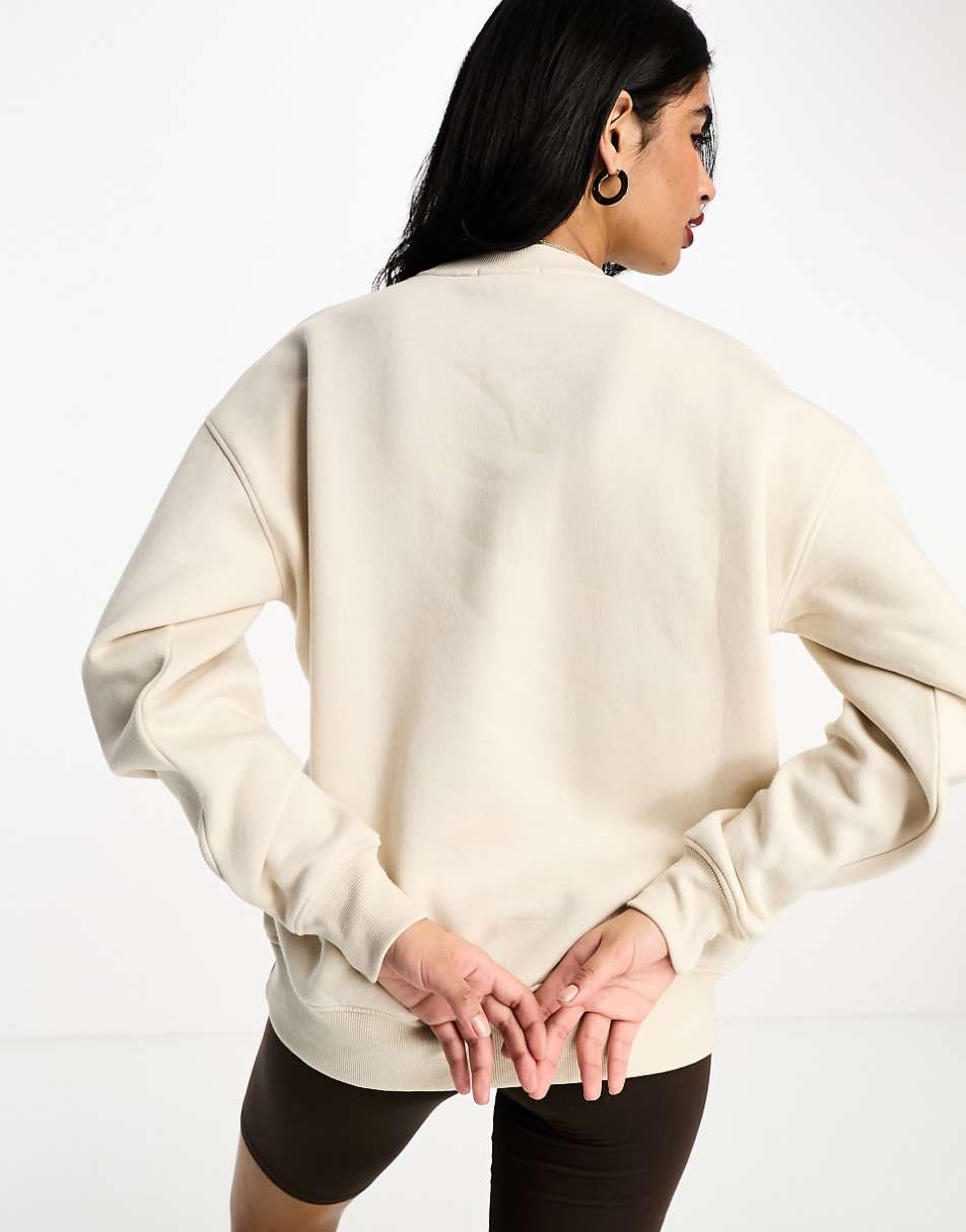 Six Stories Wifey statement sweater in champagne