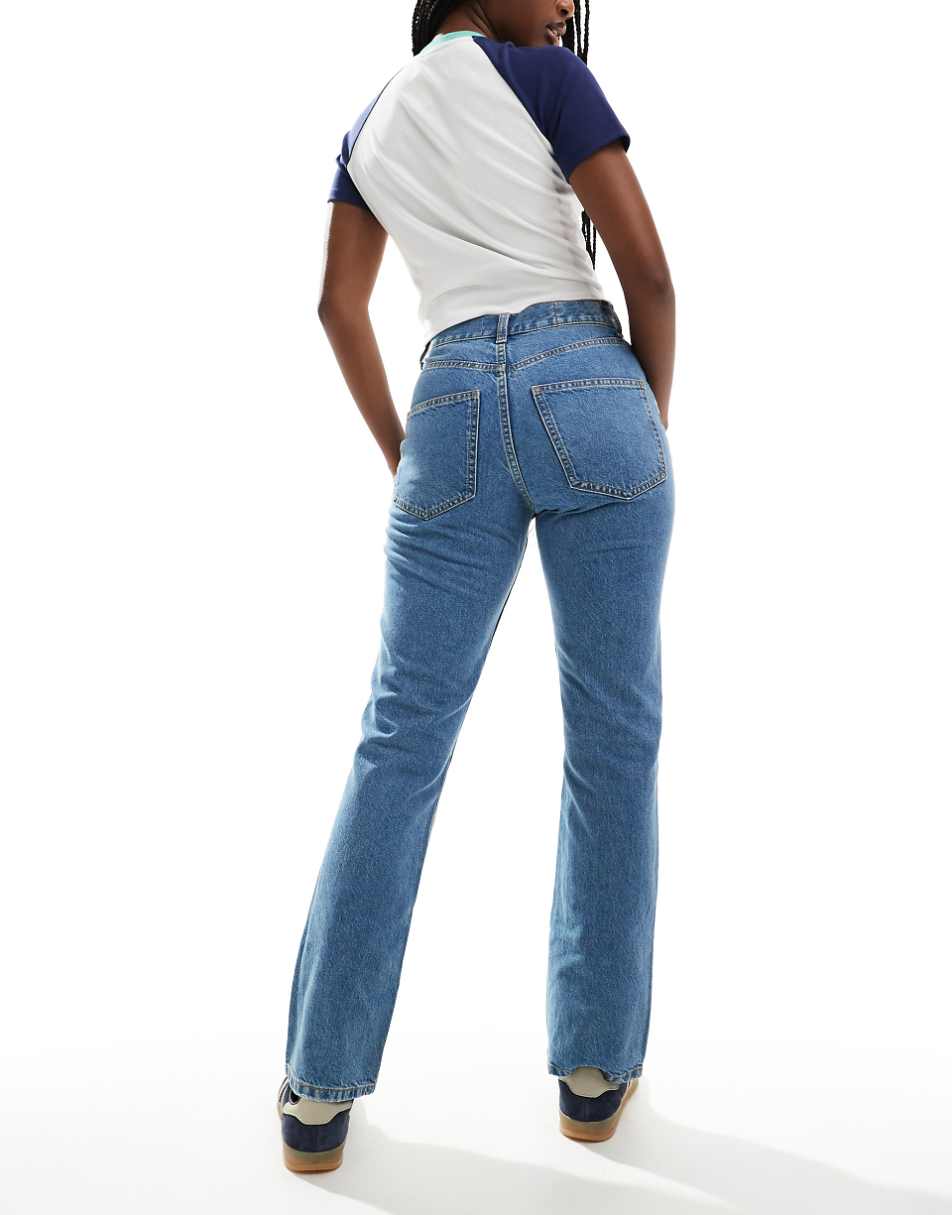 ASOS DESIGN mid rise straight jeans in mid blue