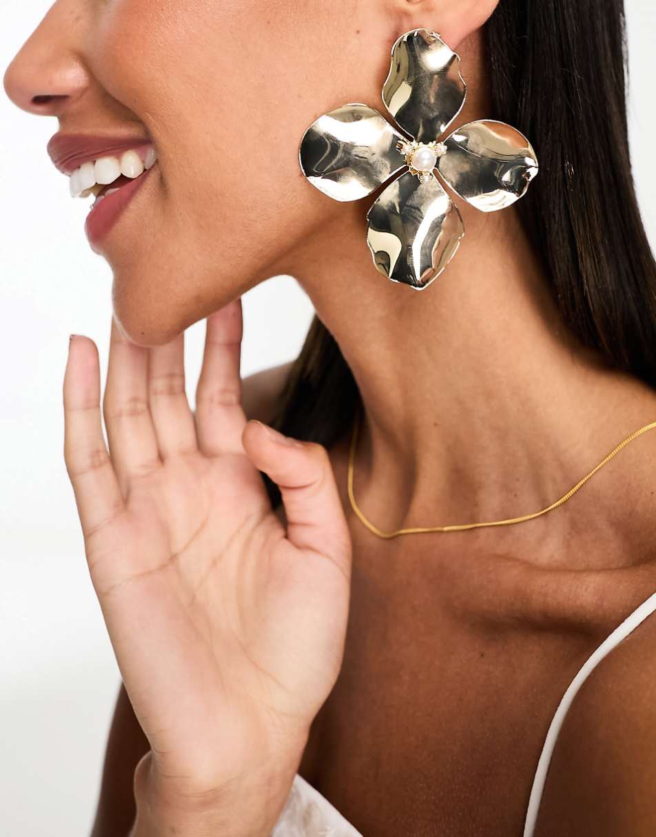 ASOS DESIGN stud earrings with oversized floral design in gold tone