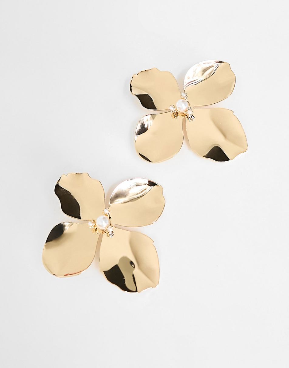 ASOS DESIGN stud earrings with oversized floral design in gold tone