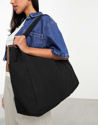 ASOS DESIGN oversized heavyweight canvas tote bag in black
