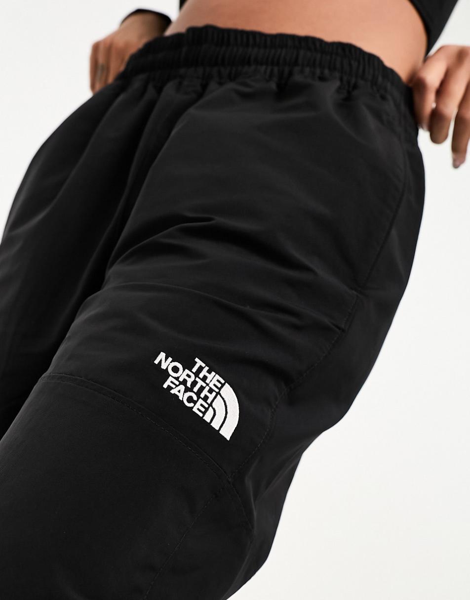 The North Face Easy Wind track pants in black