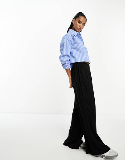 ASOS DESIGN Petite clean front wide leg pants in black