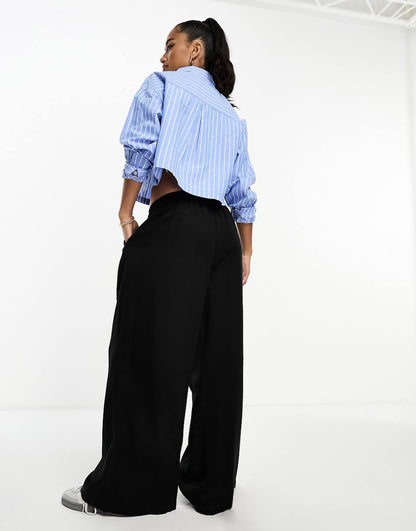 ASOS DESIGN Petite clean front wide leg pants in black