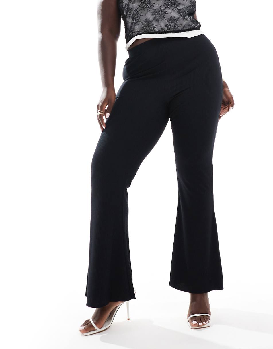 ASOS DESIGN Curve ribbed flare pants with lettuce hem in black