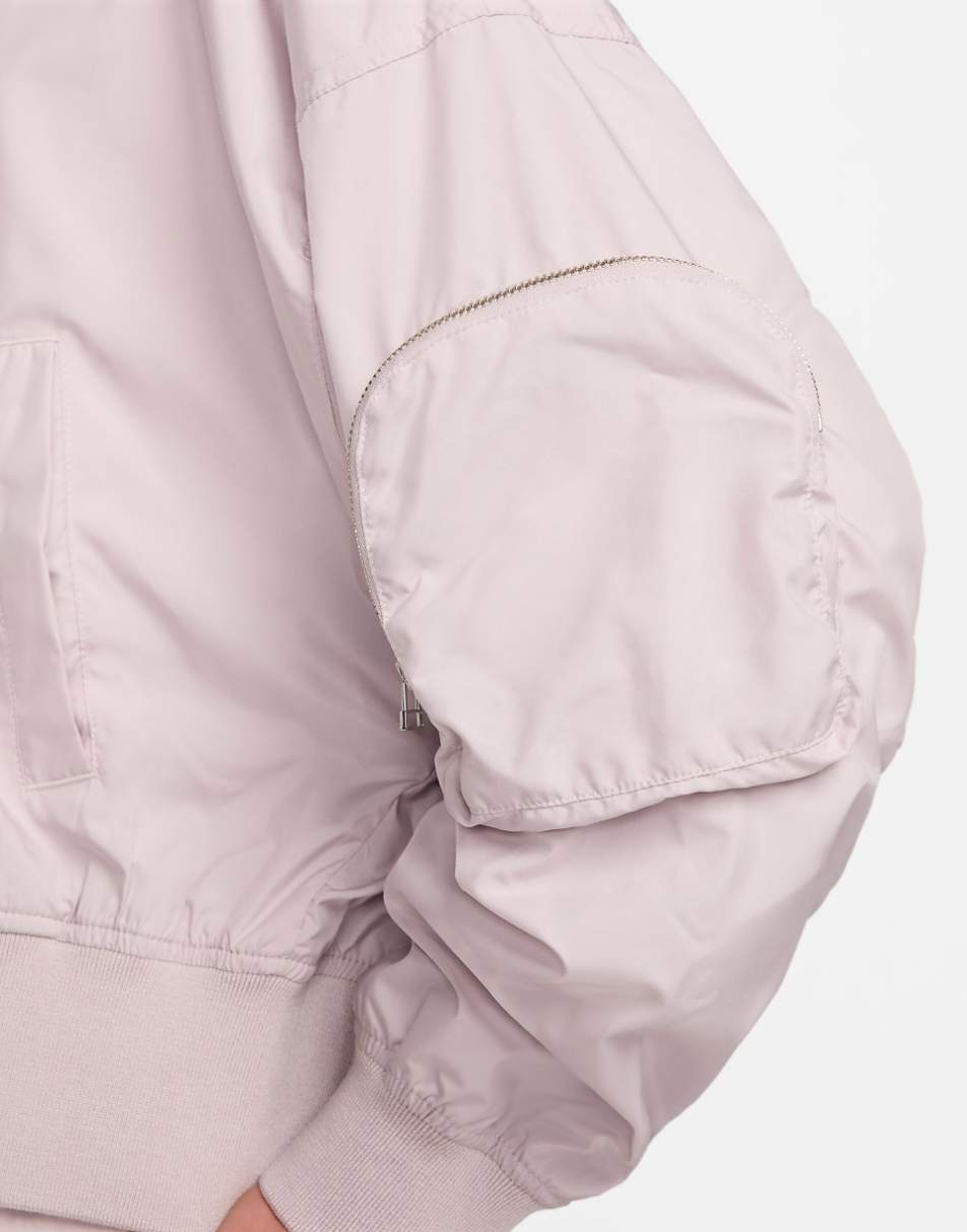Nike Essenitals oversized bomber jacket in light pink