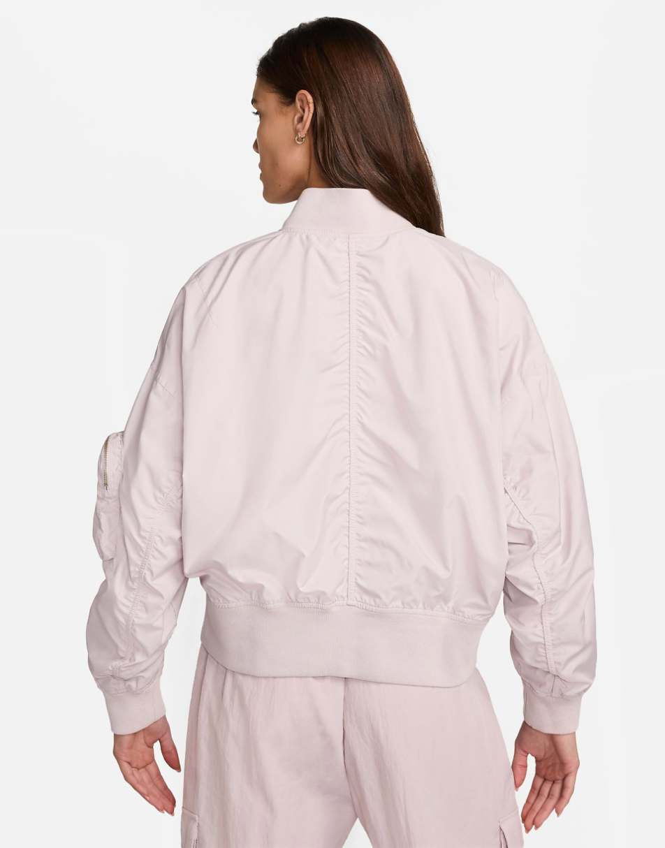 Nike Essenitals oversized bomber jacket in light pink