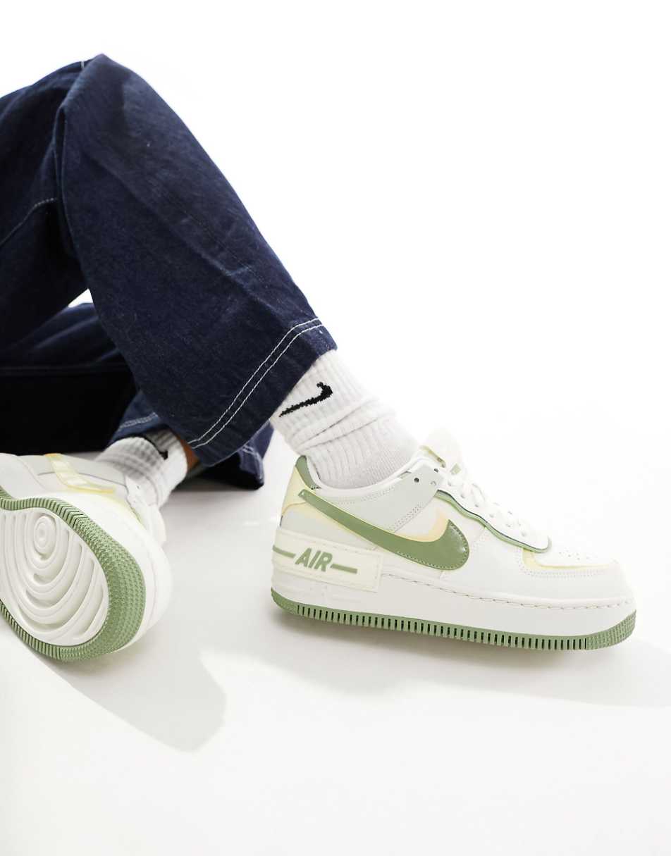 Nike Air Force 1 Shadow sneakers in white and green