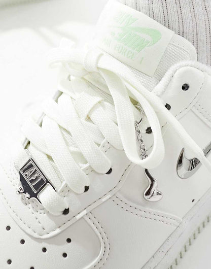 Nike Air Force 1 metallic sneakers in white
