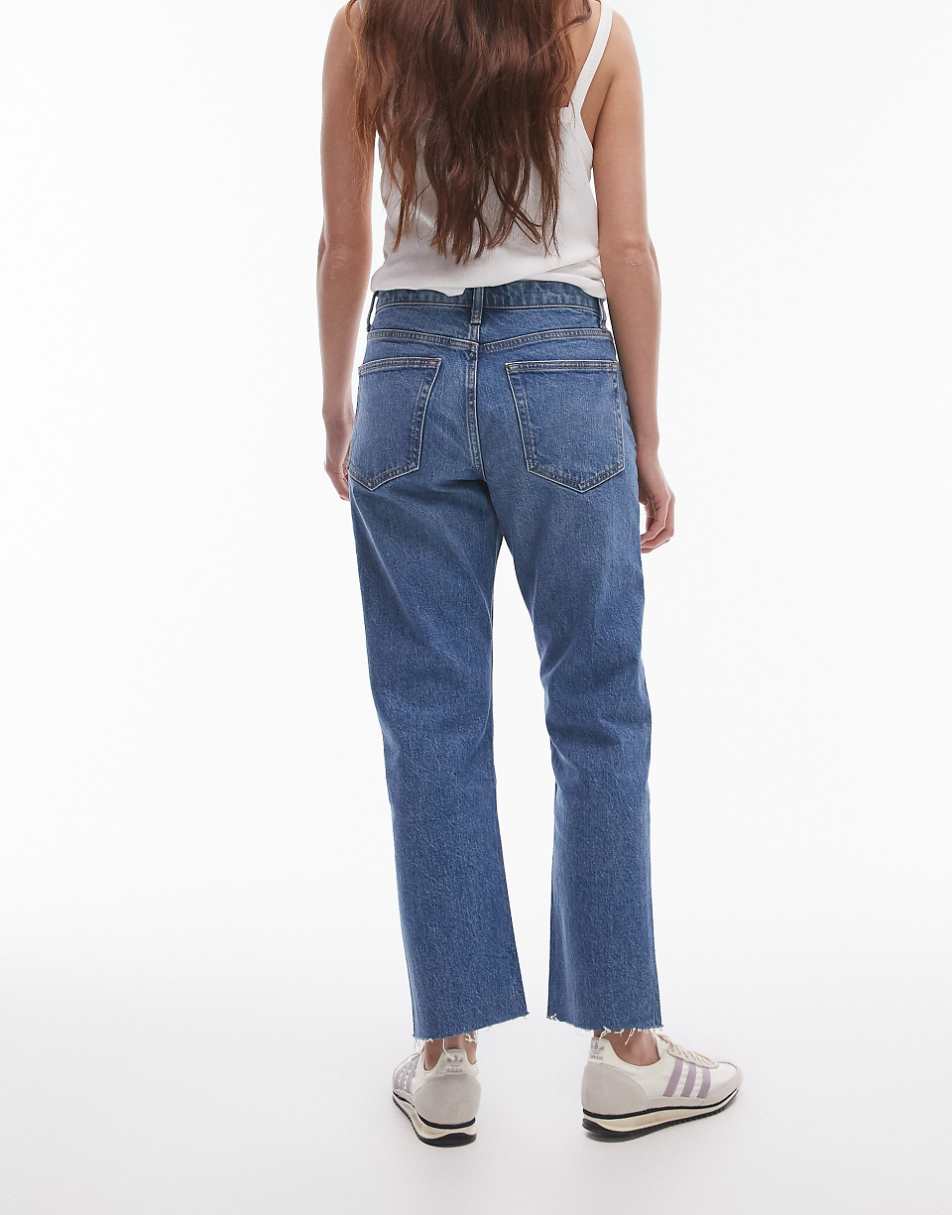 Topshop cropped mid rise straight jeans with raw hems in mid blue