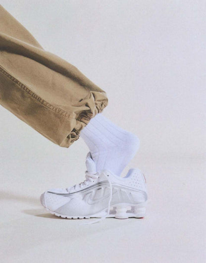 Nike Shox R4 sneakers in white and silver