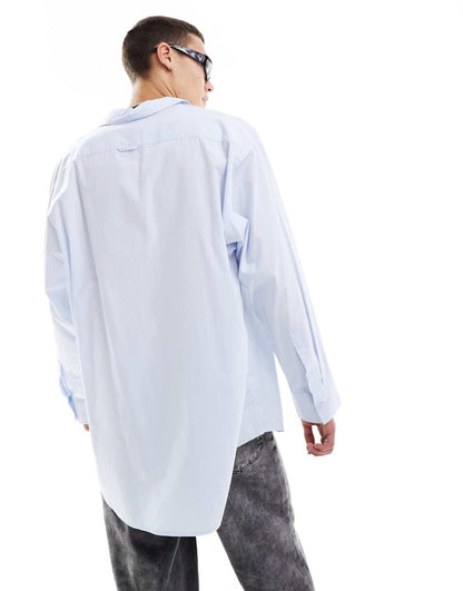 COLLUSION Unisex oversized cotton shirt in washed blue