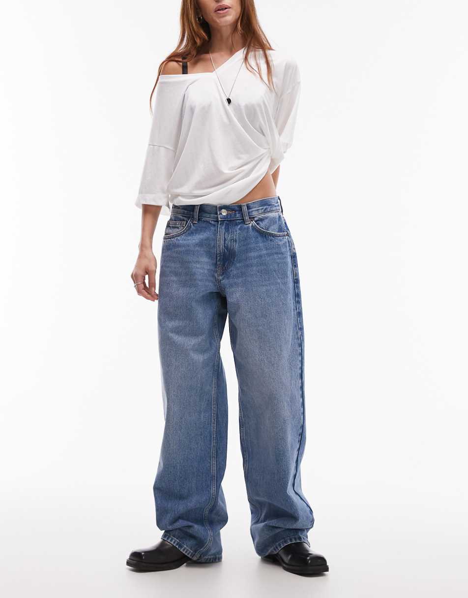 Topshop low rise Cinch back jeans in mid blue