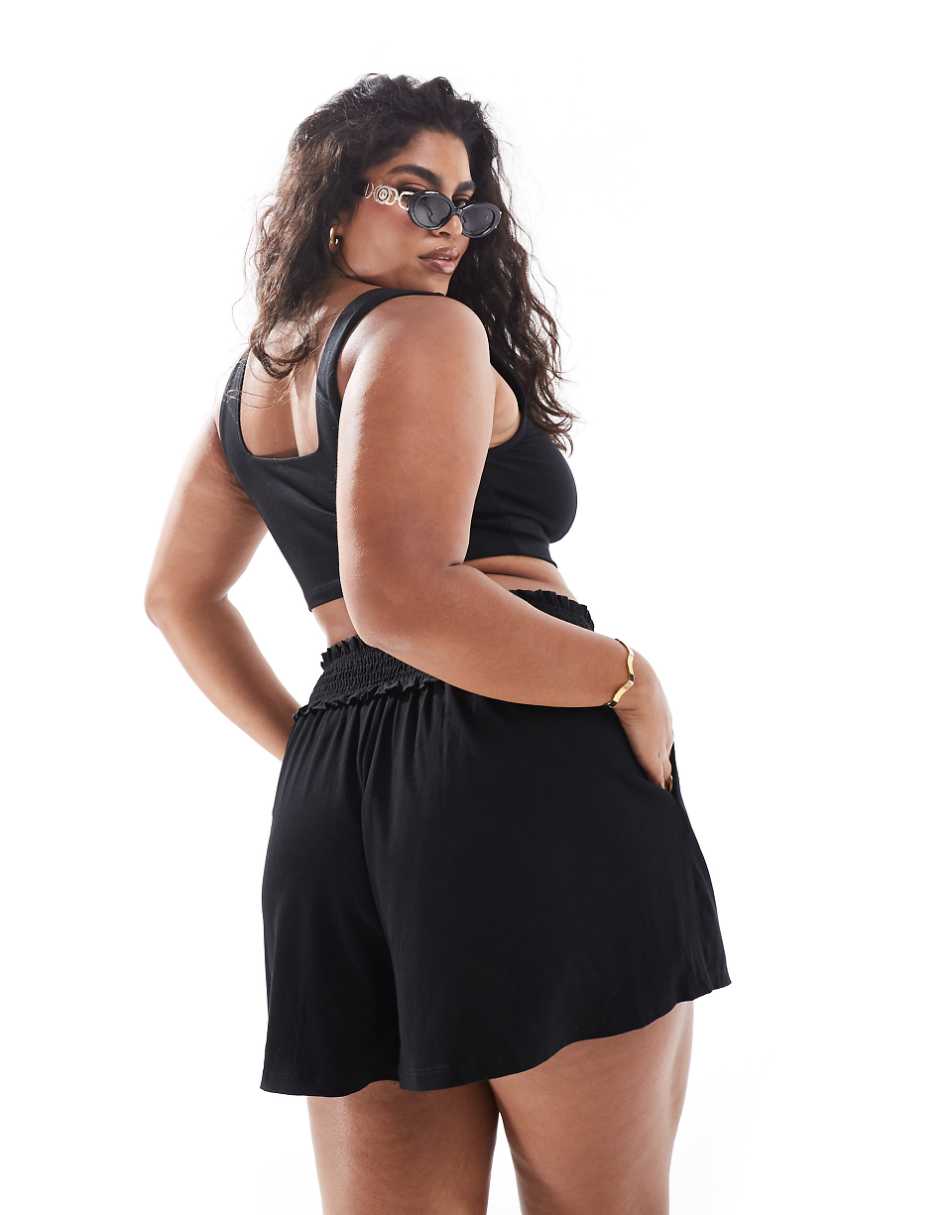 ASOS DESIGN Curve shirred waist flippy shorts in black