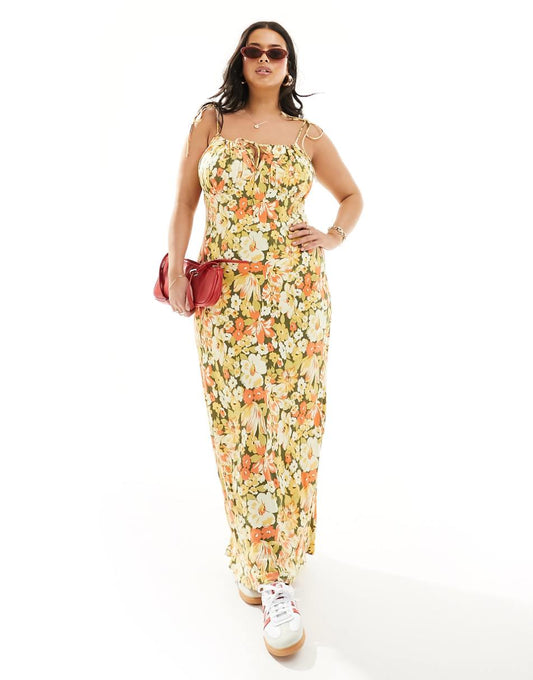 ASOS DESIGN Curve ruched bust maxi slip dress in mustard floral print