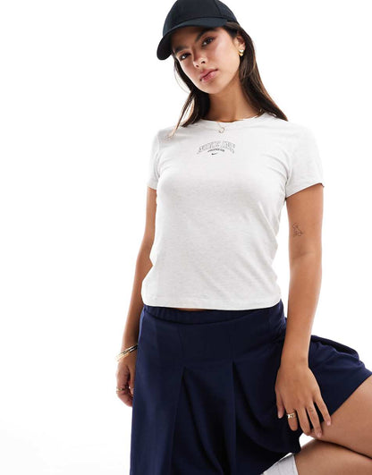 Nike Essential Athletics Club graphic cropped T-shirt in off-white