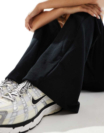 ASOS DESIGN wide leg heavyweight rib pants in black