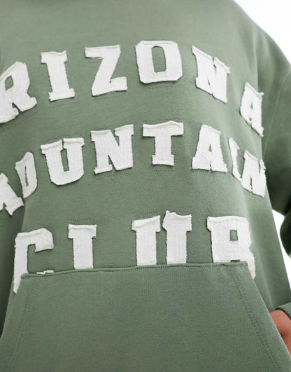 ASOS DESIGN oversized hoodie with arizona mountain club applique graphic in khaki