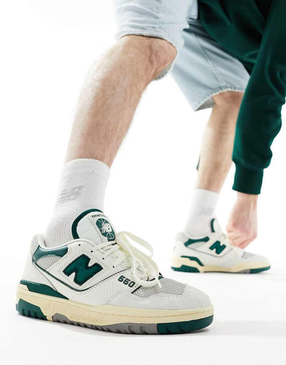 New Balance 550 sneakers in white with green and gray details