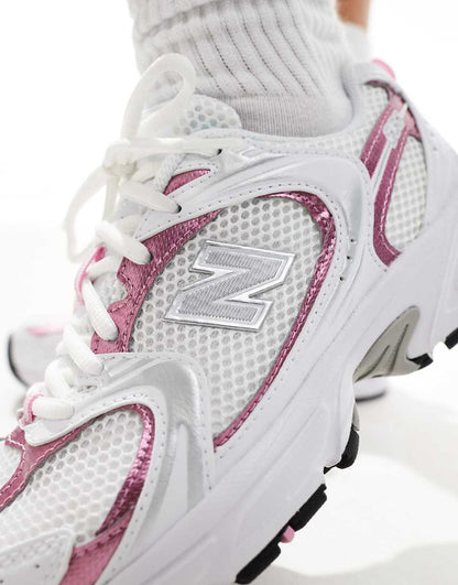 New Balance 530 sneakers in white with pink metallic details