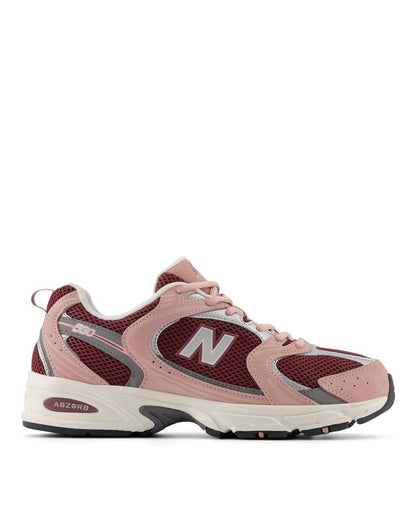 New Balance 530 sneakers in red with pink and silver details