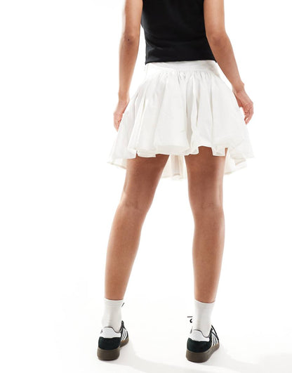 COLLUSION cotton flippy mini skirt in white