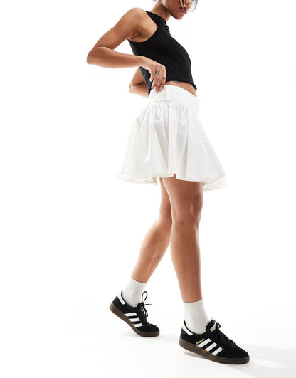 COLLUSION cotton flippy mini skirt in white