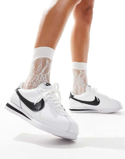 Nike Cortez sneakers in white and black