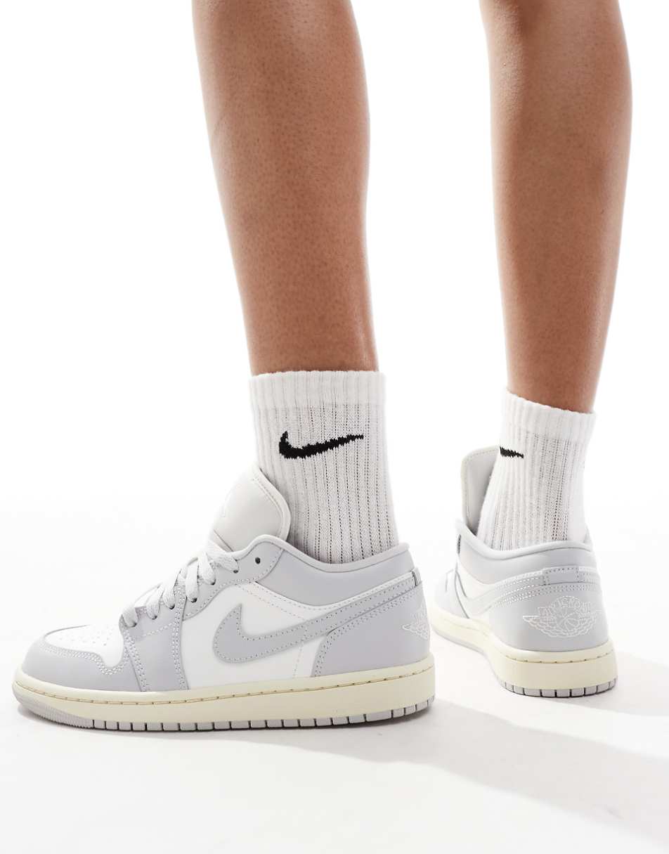 Nike Air Jordan 1 Low sneakers in white and gray