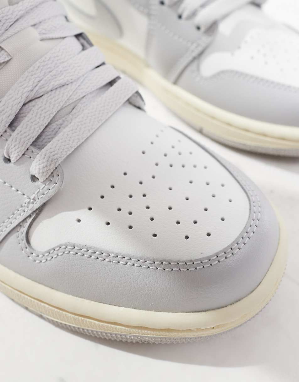 Nike Air Jordan 1 Low sneakers in white and gray