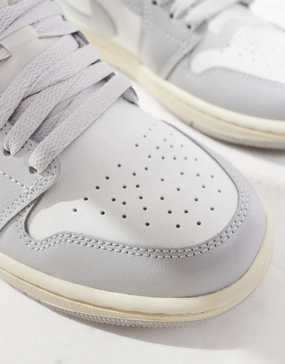 Nike Air Jordan 1 Low sneakers in white and gray