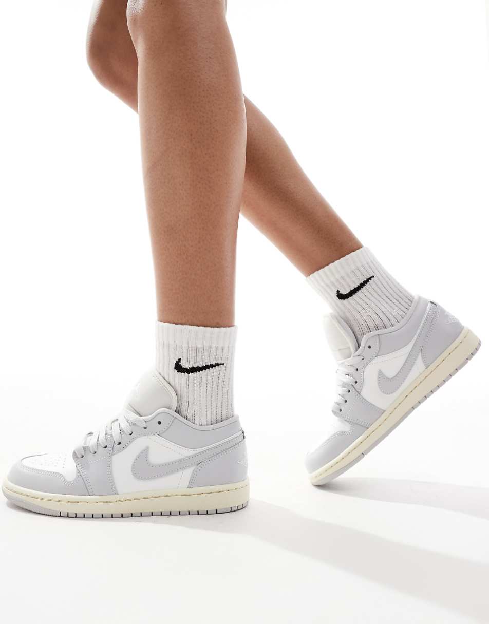 Nike Air Jordan 1 Low sneakers in white and gray