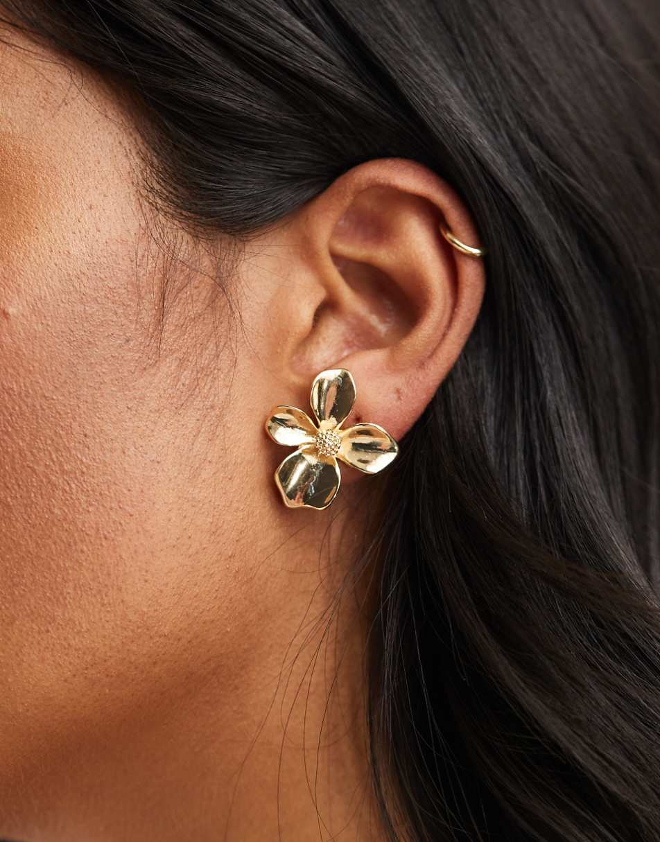 ASOS DESIGN stud earrings with small floral design in gold tone