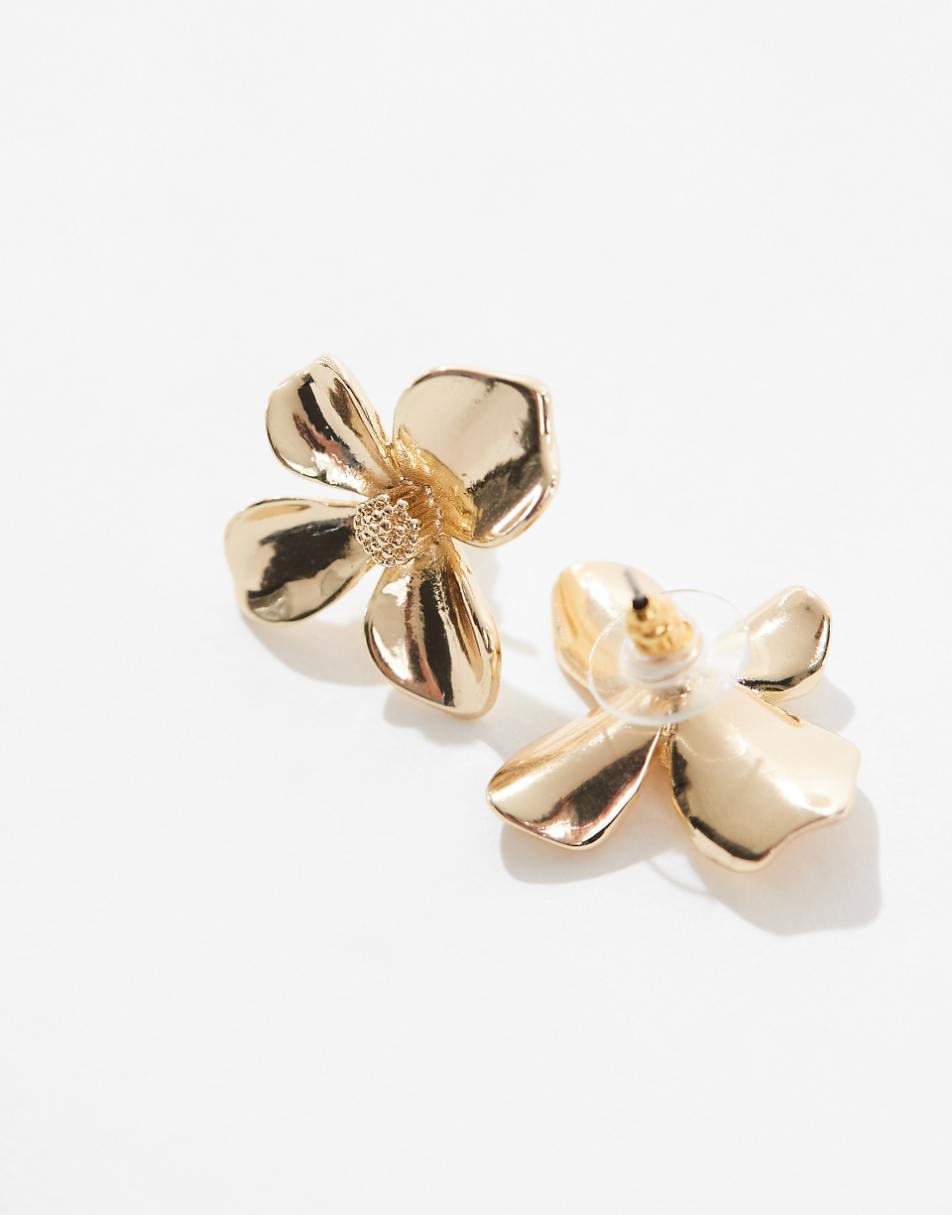 ASOS DESIGN stud earrings with small floral design in gold tone