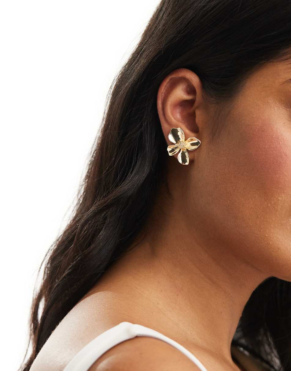 ASOS DESIGN stud earrings with small floral design in gold tone