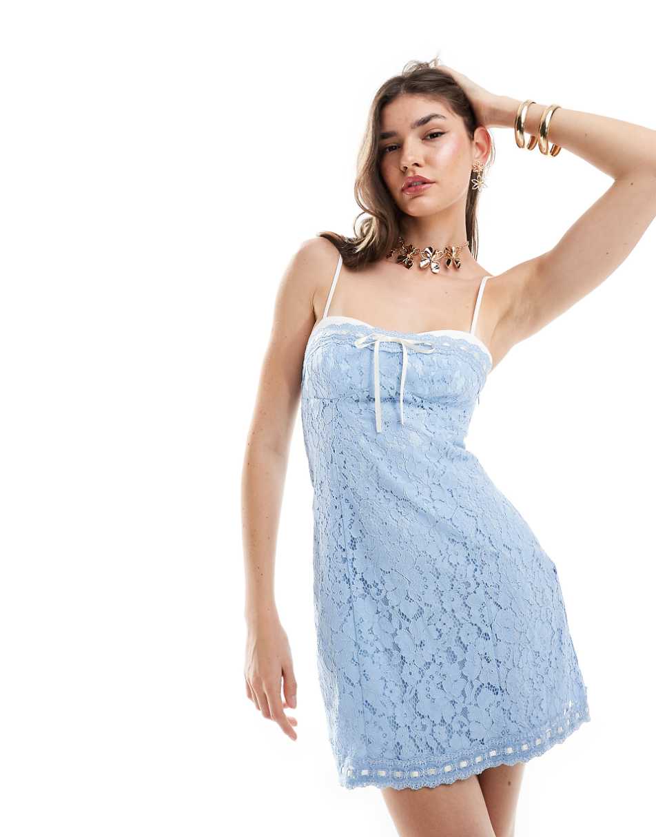 ASOS DESIGN exposed bra detail mini dress with bows in blue lace