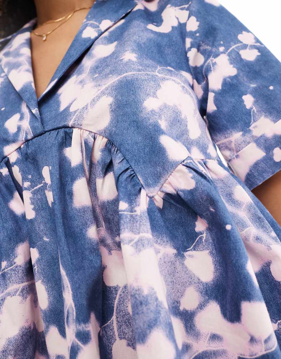 ASOS DESIGN mini shirt dress with camp collar and corset hem in blue abstract print