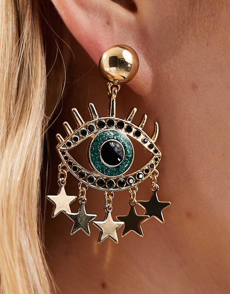 ASOS DESIGN drop earrings with eye and star detail in gold tone