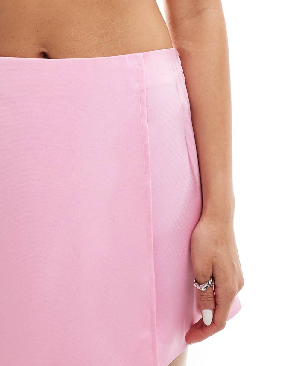 ASOS DESIGN satin wrap mini skirt in pink