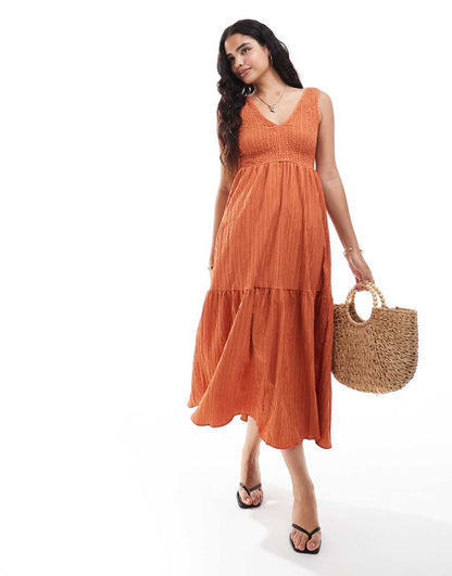 ASOS DESIGN v-neck crinkle midi sundress with tiered skirt in peach