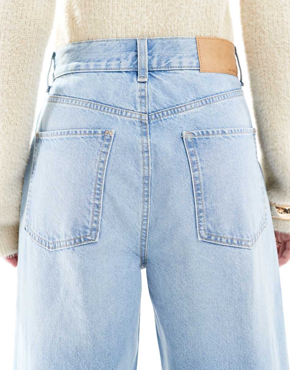 ASOS DESIGN loose jeans with deep turn up cuff in light blue