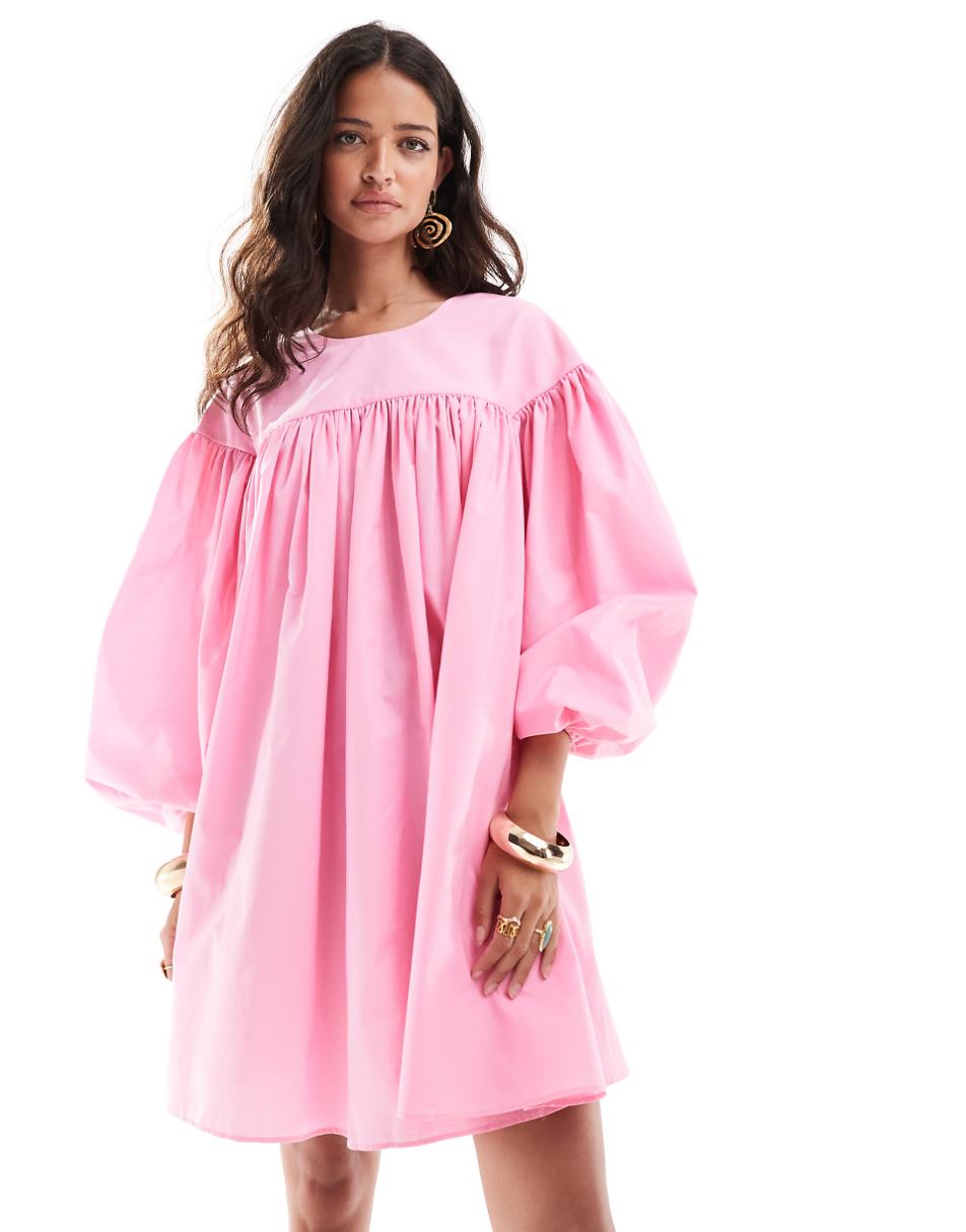 ASOS DESIGN extreme gathered smock mini dress with exaggerated sleeve and contrast bow back in pink