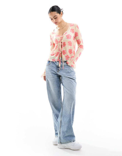 Pieces mesh tie front blouse with red floral print in cream