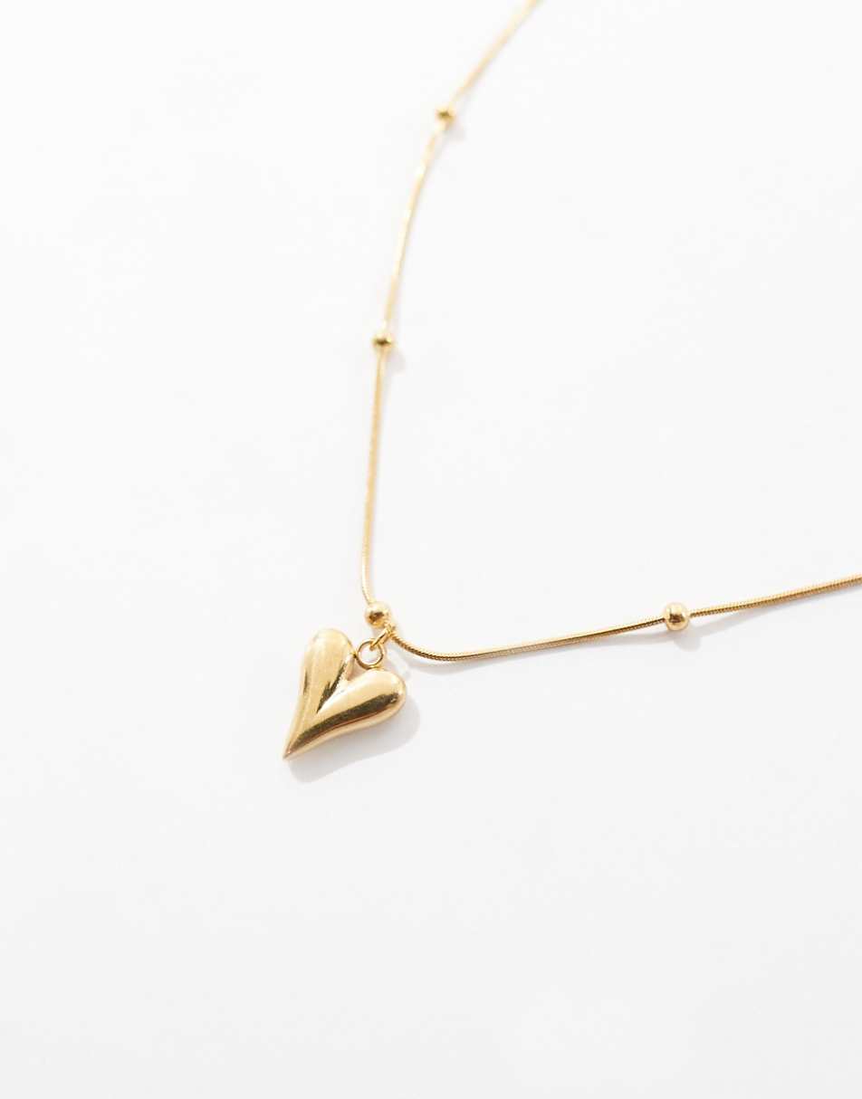 ASOS DESIGN Curve waterproof stainless steel necklace with puff heart pendant and dot dash chain in gold tone