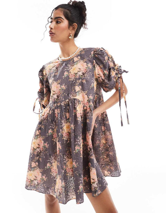 & Other Stories mini smock dress with tie detail volume sleeves in textured floral print